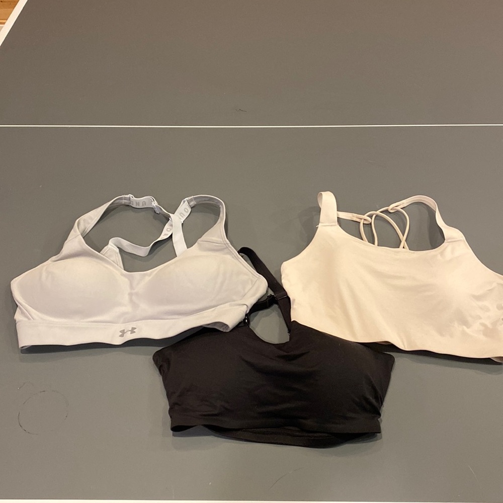 Women’s sports bras - 3 total (2 Nike and 1 UA)